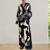 Tweedelige Dames Set met Omgekeerde Halslijn en Wijde Pijpen - Zwart Polyester Sportkleding Dames Set 1